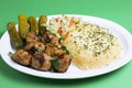 Meatballs with mashed potatoes pickles  in a plate bowl with greens vegetables Royalty Free Stock Photo