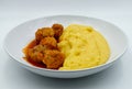 Meatballs and Polenta in a white dish Royalty Free Stock Photo