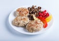 meatballs with rice mushrooms, sweet peppers and pomegranate seeds isolated on white background Royalty Free Stock Photo