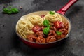 Meatballs set. Spaghetti pasta with meatballs and tomato sauce in a pan with basil on black background. Restaurant menu, dieting, Royalty Free Stock Photo