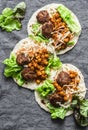 Meatballs, spicy stewed chickpeas and cabbage slaw tortilla - delicious snack, brunch, appetizers, tapas