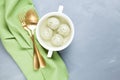 Meatballs with spinach in bone broth. Prepared from homemade minced chicken or turkey. A healthy dietary product with collagen. Royalty Free Stock Photo