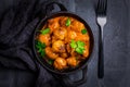 Meatballs with tomato sauce in black pan Royalty Free Stock Photo