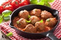 Meatballs with tomato sauce in black pan Royalty Free Stock Photo