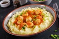Meatballs in tomato sauce with mashed potatoes in bowl