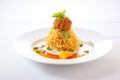 meatballs in tomato sauce with spaghetti nest on white ceramic Royalty Free Stock Photo