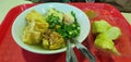 meatballs wonton deep fried served with soup, it called bakso malang, at bakso mas gun malang, east java, indonesia