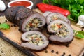 Meatloaf roll stuffed with mushrooms, sweet pepper and tomato sauce Royalty Free Stock Photo