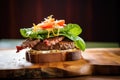 meatloaf sandwich on rustic bread with lettuce