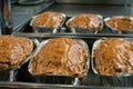 Meatloaf in trays fresh pulled out from the oven