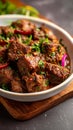 Meaty indulgence Dry spicy Murgh or goat meat in a plate