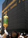 Close frame for Holy Kaaba in Mecca with man hand and lantern Royalty Free Stock Photo