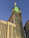 Blue sky with Abraj Al Bait (Royal Clock Tower Makkah) hotel with big clock on top