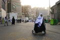 Muslim woman from Indonesia using a wheelchair
