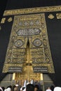 MECCA, SAUDI ARABIA - MAY 01 2018: The golden doors of the Holy Kaaba closeup, covered with Kiswah. Massive lock on the doors. Ent