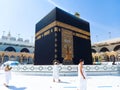 The Holy Kaaba Mecca - Pilgrims return to Masjid al-Haram in Makka for limited umrah as  coronavirus restrictions - face mask wear Royalty Free Stock Photo