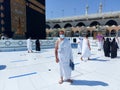 The Holy Kaaba Mecca - Pilgrims return to Masjid al-Haram in Makka for limited umrah as  coronavirus restrictions - face mask wear Royalty Free Stock Photo