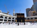 The Holy Kaaba Mecca - Pilgrims return to Masjid al-Haram in Makka for limited umrah as  coronavirus restrictions - face mask wear Royalty Free Stock Photo