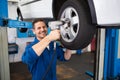 Mechanic adjusting the tire wheel