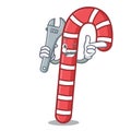 Mechanic candy canes mascot cartoon