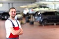 Mechanic in a car repair shop - diagnosis and troubleshooting Royalty Free Stock Photo