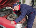 Mechanic Checking Engine Royalty Free Stock Photo