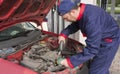 Mechanic Checking Engine Royalty Free Stock Photo