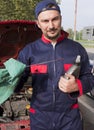 Mechanic Checking Engine Royalty Free Stock Photo