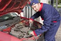Mechanic Checking Engine Royalty Free Stock Photo