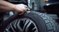 Mechanic checking tire tread depth and wear using a tire gauge, generative ai