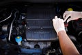 Mechanic checks auto electronic control unit