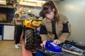 mechanic choosing tools to fix quad bike