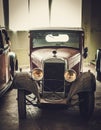 Mechanic in classic car restoration workshop Royalty Free Stock Photo