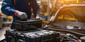 Mechanic Collecting A Replacement Battery From The Service Center For Car Battery Installations