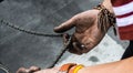 Mechanic Dirty hands fixing a bicycles chain