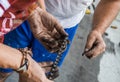 Mechanic Dirty hands fixing a bicycles chain