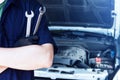 Mechanic engineer repair car at car service station Royalty Free Stock Photo