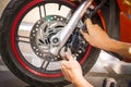 Mechanic fixing motocycle worn motorcycle drum breaks shoes
