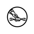 Mechanic Hand Holding Out Spanner Circle Retro Black and White Royalty Free Stock Photo