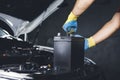 Technician replace car old battery Royalty Free Stock Photo