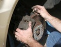 Mechanic Hands On Brakes Royalty Free Stock Photo