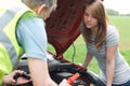 Mechanic Helping Broken Down Female Motorist