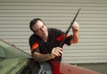 Mechanic Installing A New Wiper Blade Royalty Free Stock Photo