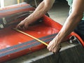 MECHANIC MAKING REPAIRS IN THE WORKSHOP