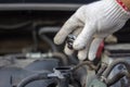 Mechanic man checking radiator cooling tank. Driver check the ca