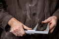 Mechanic measuring gears. Work in a mechanical workshop