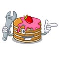 Mechanic pancake with strawberry mascot cartoon