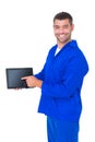 Mechanic pointing on digital tablet on white background