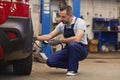 Mechanic Pumping Tires