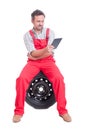 Mechanic reading from wireless tablet